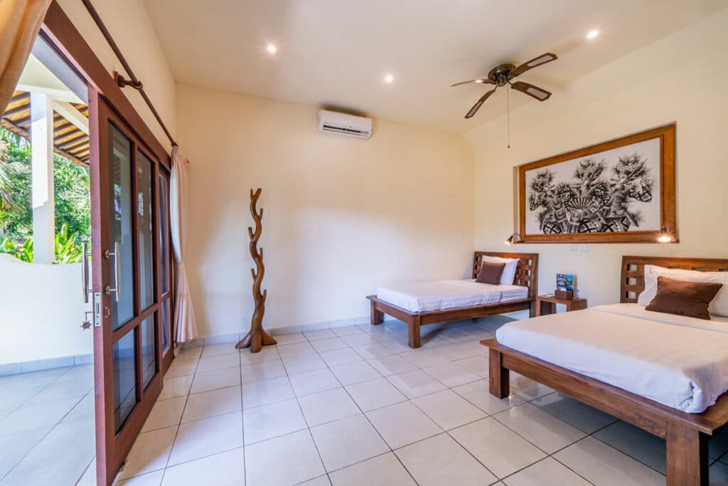 Bungalow with single beds at Ocean Sun Dive Resort